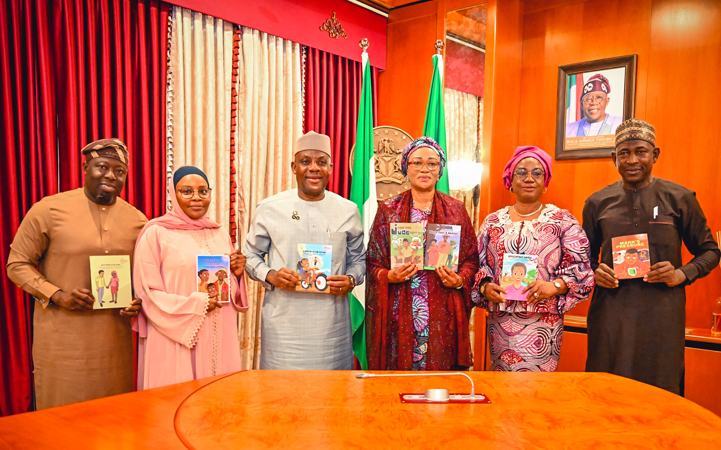 FIRST LADY HANDS OVER BOOKS ON GIRL CHILD DEVELOPMENT TO FEDERAL MINISTRY OF EDUCATION