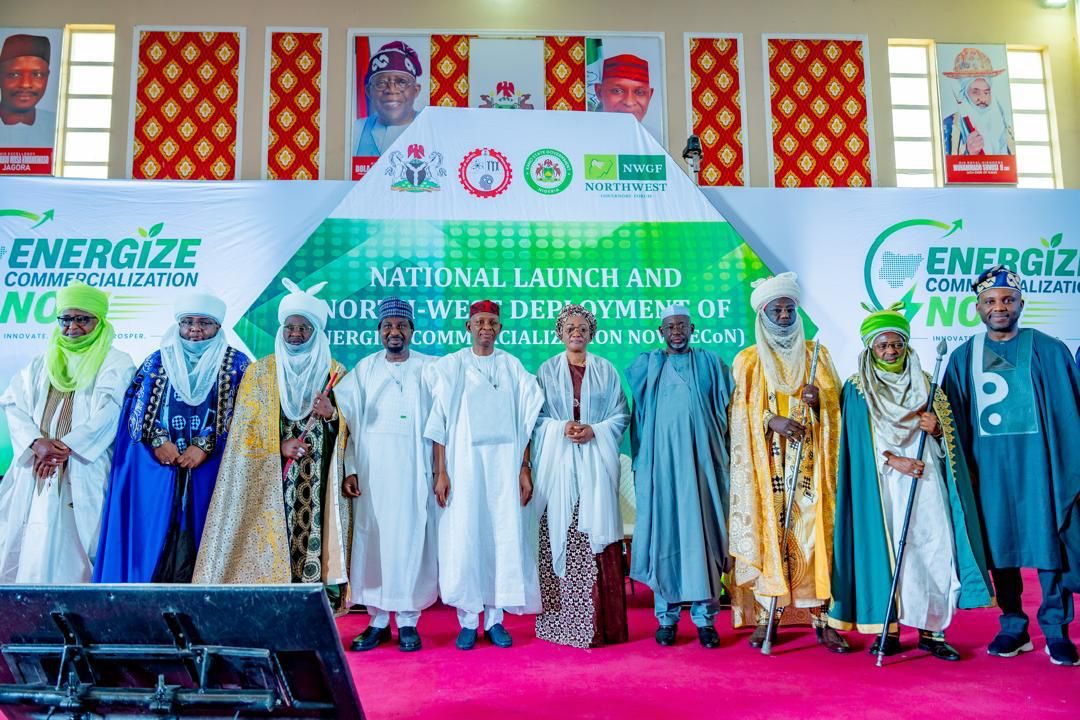 First Lady Senator Oluremi Tinubu, CON, and dignitaries standing on stage in front of a banner for the National Launch and North-West Deployment of Energize Commercialization (ECoN).